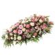 Funeral spray of mixed flowers in pink colour
