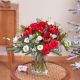 White and red Christmas bouquet of mixed flowers