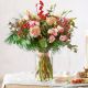 Red and light pink Christmas bouquet