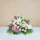 Funeral composition in delicate pink tones