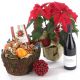 Poinsettia Plant, red wine and Basket with Sweets