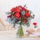 Send Bouquet-of-mixed-red-flowers-Min to Spain