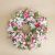 Send Small-premium-funeral-wreath-in-shades-of-pink to Portugal