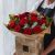 Send 12-Red-Rose-Hand-Tied to United Kingdom