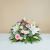 Funeral composition in delicate pink tones