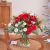 White and red Christmas bouquet of mixed flowers