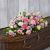 Send Rose-and-Eryngium-Casket-Spray-Min to United Kingdom