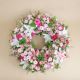 Send Small-premium-funeral-wreath-in-shades-of-pink to Spain