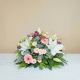 Funeral composition in delicate pink tones